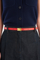 Profile view of model wearing the Oroton Yvonne Narrow Belt in Dark Ruby and Premium pebble leather for Women .