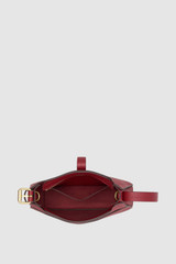 Internal product shot of the Oroton Dylan Mini Baguette Crossbody in BERRY and Premium pebble leather for Women .