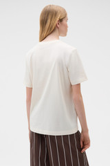 Profile view of model wearing the Oroton Maggie Graphic Tee in Calico and 100% cotton single jersey fabric for Women .