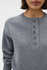 Profile view of model wearing the Oroton Rib Knit Henley in Grey Marle and 100% supersoft merino wool fabric for Women .