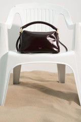 Detail product shot of the Oroton Lewis Crackle Day Bag in Copper and Premium smooth leather for Women .