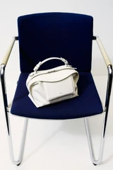 Detail product shot of the Oroton Mica Smooth Bowler in Warm White and Premium smooth leather for Women .