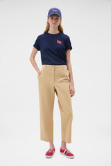Profile view of model wearing the Oroton Arlo Carpenter Chino in Praline and 100% cotton fabric for Women .
