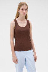 Profile view of model wearing the Oroton Scoop Neck Tank in Chocolate and 92% cotton and 8% spandex blend fabric for Women .