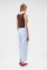 Profile view of model wearing the Oroton Arlo Carpenter Chino in Pale Blue and 100% cotton fabric for Women .