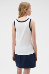 Profile view of model wearing the Oroton Contrast Bind Tank in Antique White and 92% cotton and 8% spandex blend fabric for Women .