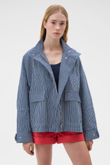 Profile view of model wearing the Oroton Washed Weekend Stripe Parka in Dark Navy and 100% cotton fabric for Women .