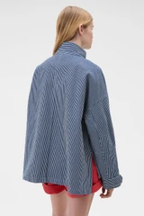 Profile view of model wearing the Oroton Washed Weekend Stripe Parka in Dark Navy and 100% cotton fabric for Women .