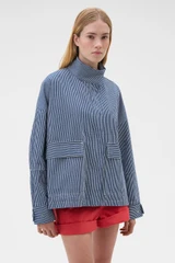 Profile view of model wearing the Oroton Washed Weekend Stripe Parka in Dark Navy and 100% cotton fabric for Women .