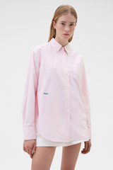 Profile view of model wearing the Oroton Oxford Stripe Shirt in Perfect Pink and 100% cotton fabric for Women .