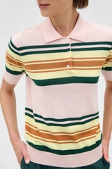Profile view of model wearing the Oroton Multi Stripe Knit Polo in Multi and 100% cotton fabric for Women .